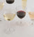 Image of various glasses of Avaline wines on a white table