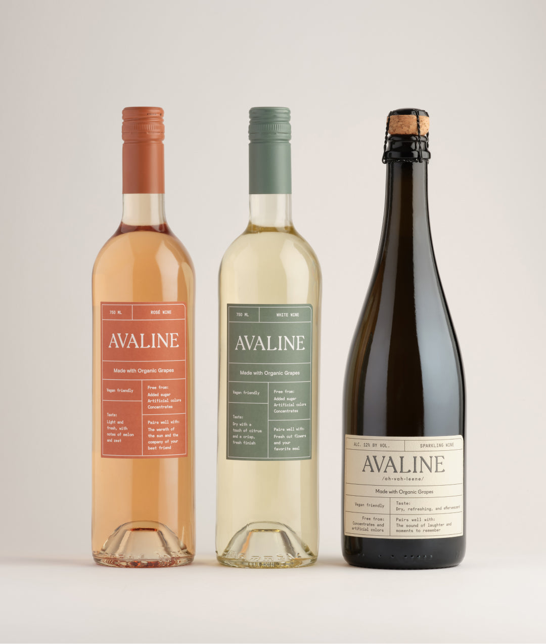 A lineup of wine bottles featuring Avaline White, Rosé, and Sparkling against a white background.